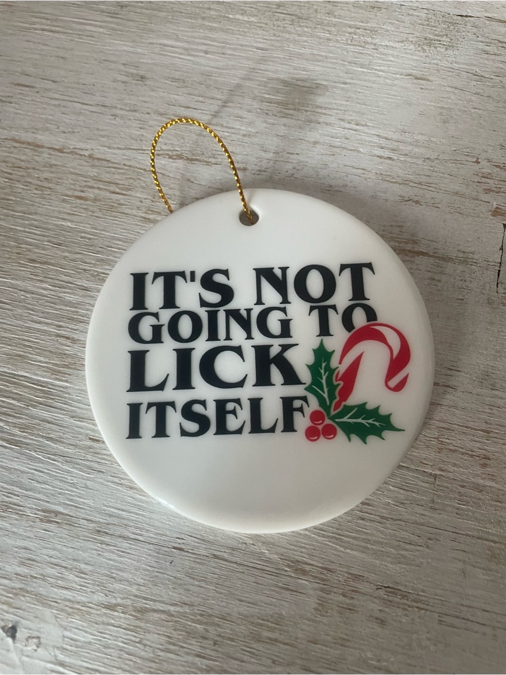 “IT’S NOT GOING TO LICK ITSELF” Ceramic Christmas Ornament